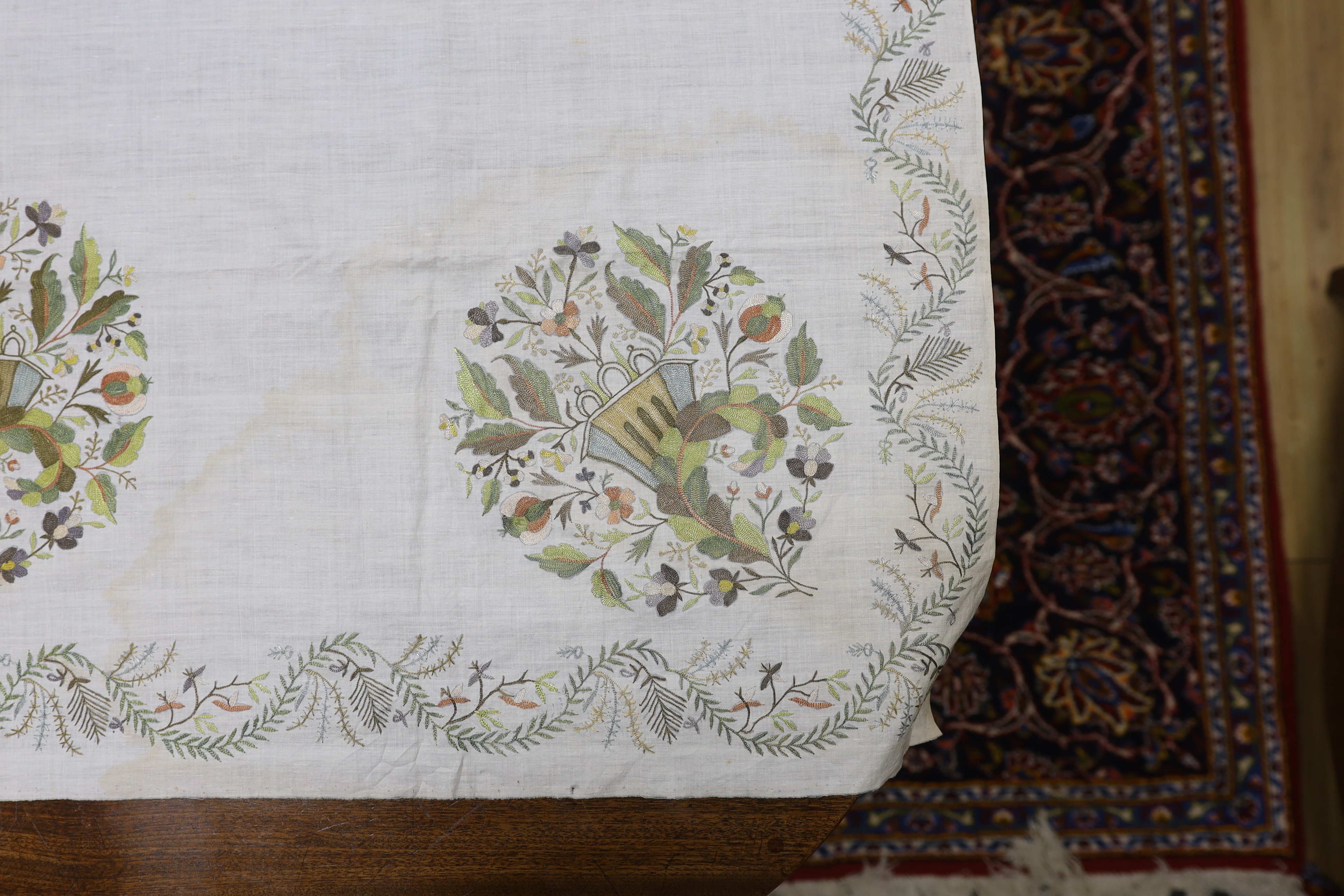 A late 18th-19th century fine linen chain stitched floral embroidered panel, possibly Kashmiri, using traditional design elements and embroidery similar from earlier embroideries of this kind worked on narrower looms, 22